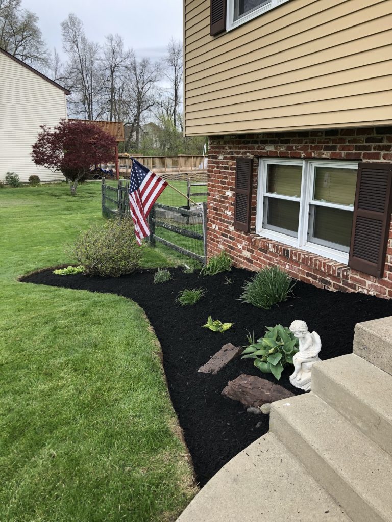 new mulch in front of house